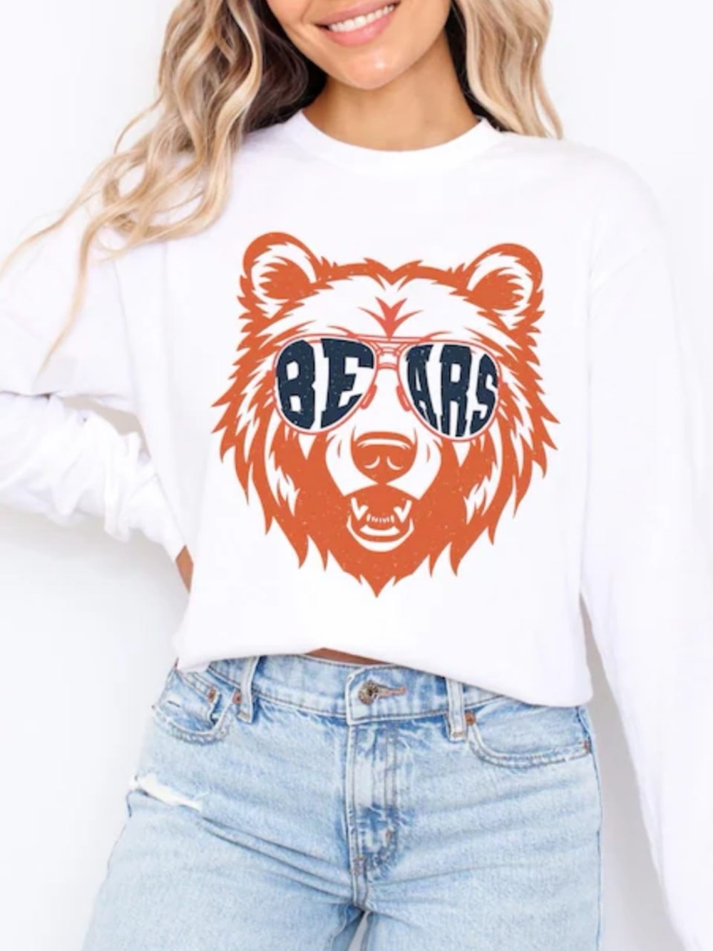 White Sweatshirt with Orange Bear Graphic and Navy Sunglasses